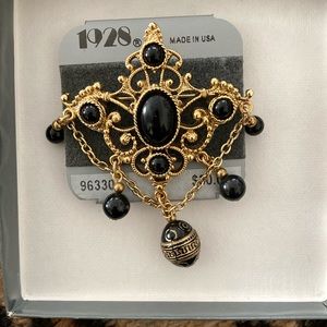 1928 art deco black/gold tone crown pin. NWT. Pretty w/jacket, coat, sweater.